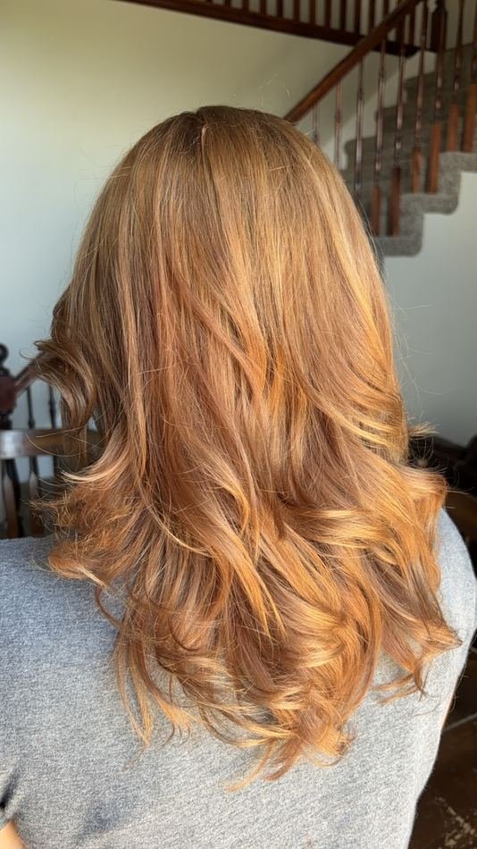 Blonde balayage with soft waves